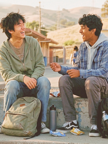 East Asian or South Asian teenager, age 15–17, looking out a window, Bay Area suburban home. Quiet, contained expression.