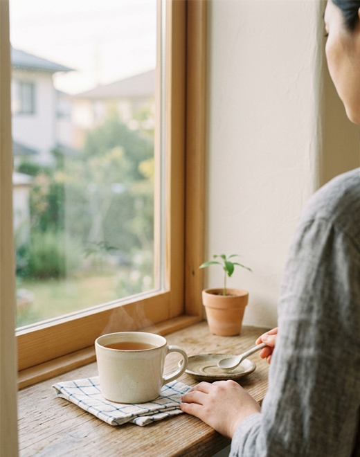 A quiet morning window and cup — grief held gently, Leela Mental Health grief therapy Palo Alto